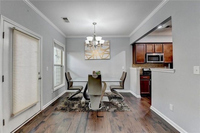 3351 Vintage Cir SE, Smyrna, GA 30080 - dining area with a chandelier, dark wood finished floors, crown molding, and baseboards