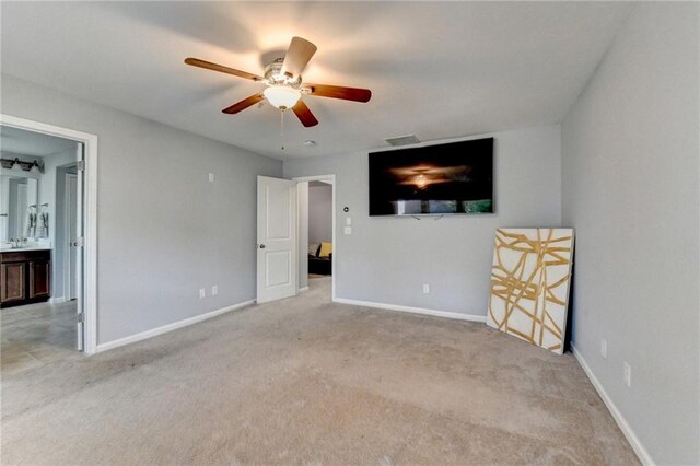 3351 Vintage Cir SE, Smyrna, GA 30080 - unfurnished bedroom featuring light colored carpet, baseboards, ensuite bath, and ceiling fan