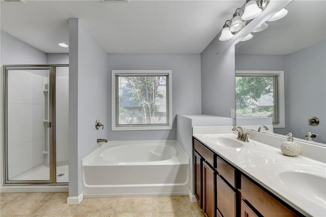 3351 Vintage Cir SE, Smyrna, GA 30080 - full bath featuring a stall shower, a bath, double vanity, tile patterned floors, and baseboards