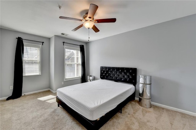 3351 Vintage Cir SE, Smyrna, GA 30080 - carpeted bedroom with baseboards and a ceiling fan
