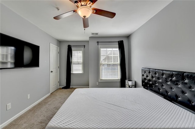 3351 Vintage Cir SE, Smyrna, GA 30080 - bedroom with light carpet, baseboards, and ceiling fan