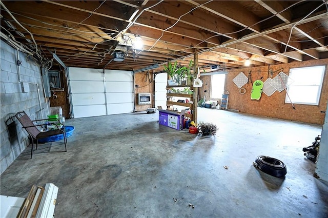 garage with heating unit and a garage door opener