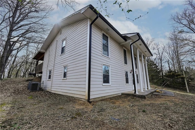 view of side of property with central AC unit