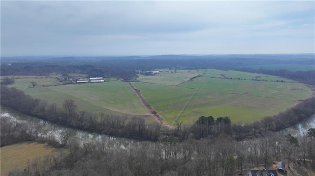 birds eye view of property featuring a rural view