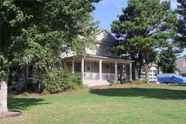 view of front of house with a porch and a front lawn