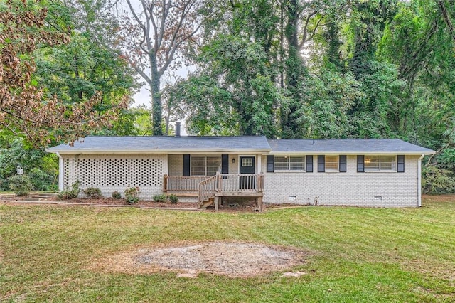 ranch-style house featuring a front lawn