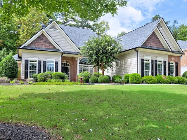 view of front of property with a front lawn