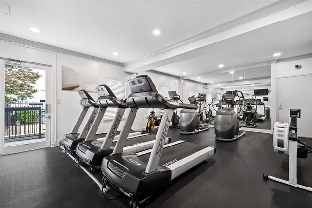 workout area with recessed lighting and ornamental molding
