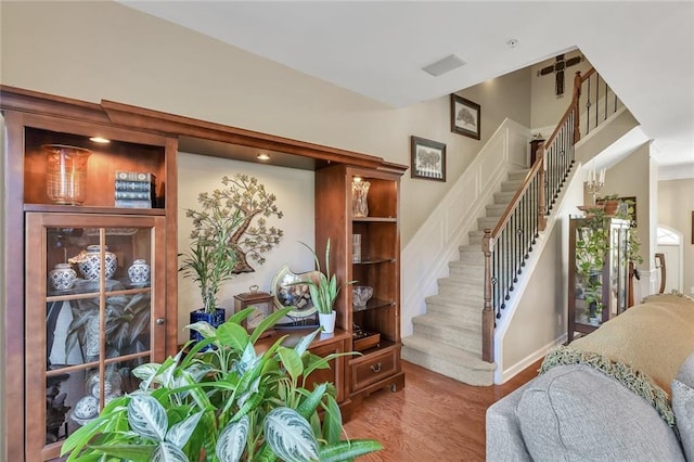 interior space featuring visible vents and wood finished floors