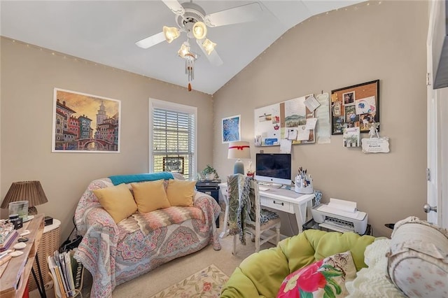 living room featuring lofted ceiling, ceiling fan, and carpet