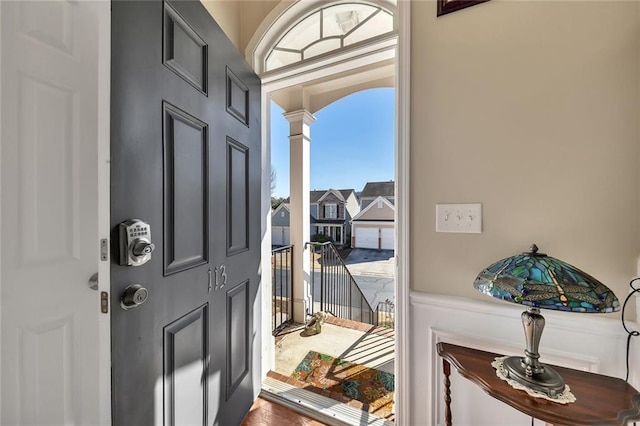 entrance foyer featuring decorative columns