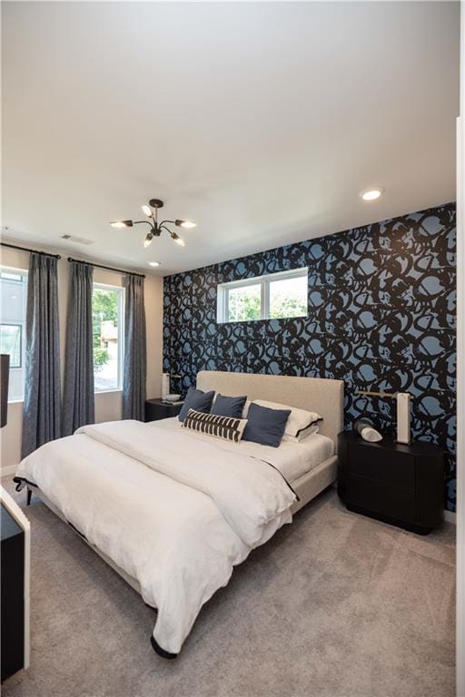 bedroom featuring ceiling fan and carpet flooring