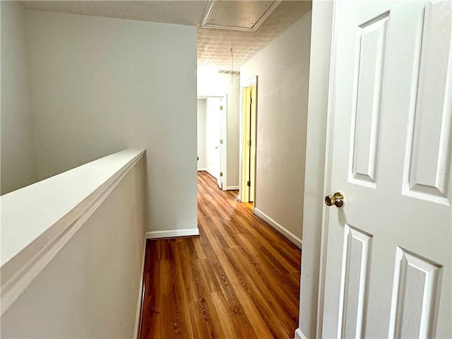 3884 Grovemont Pl, Duluth, GA 30096 - hallway featuring attic access and wood finished floors