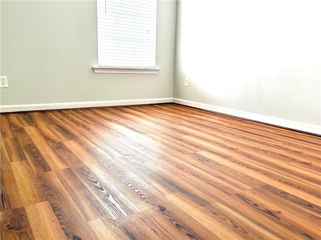 3884 Grovemont Pl, Duluth, GA 30096 - unfurnished room with wood finished floors and baseboards