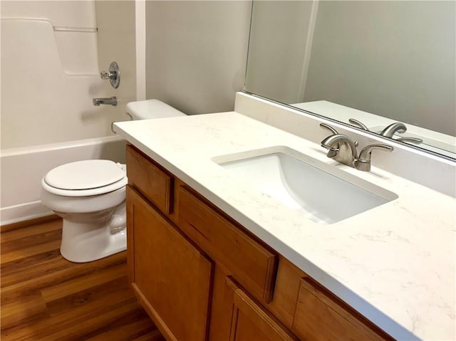 3884 Grovemont Pl, Duluth, GA 30096 - full bathroom with wood finished floors, vanity, and shower / bath combination
