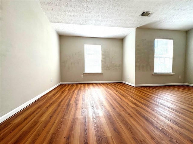 3884 Grovemont Pl, Duluth, GA 30096 - empty room featuring wood finished floors and baseboards