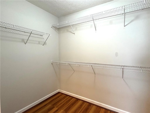 3884 Grovemont Pl, Duluth, GA 30096 - spacious closet featuring wood finished floors