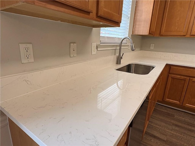 3884 Grovemont Pl, Duluth, GA 30096 - kitchen featuring brown cabinetry, light stone countertops, and dark wood finished floors