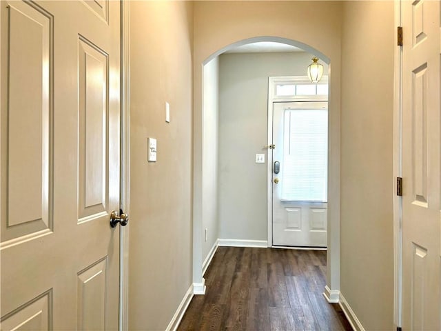3884 Grovemont Pl, Duluth, GA 30096 - foyer entrance with arched walkways and dark wood finished floors