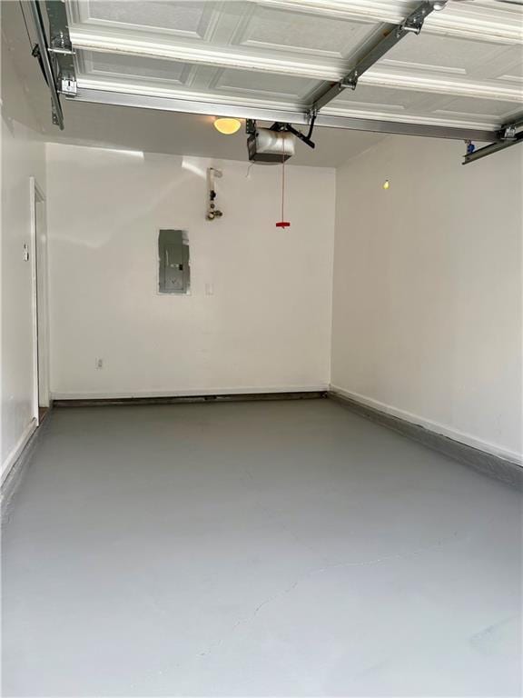 3884 Grovemont Pl, Duluth, GA 30096 - garage with electric panel and a garage door opener