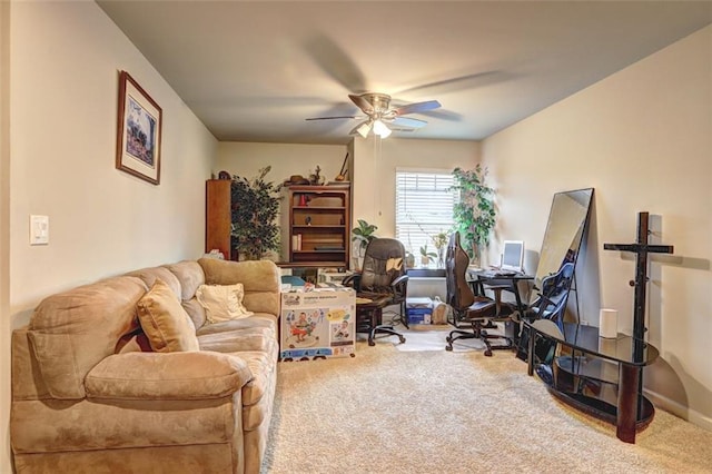 office space featuring ceiling fan and carpet floors