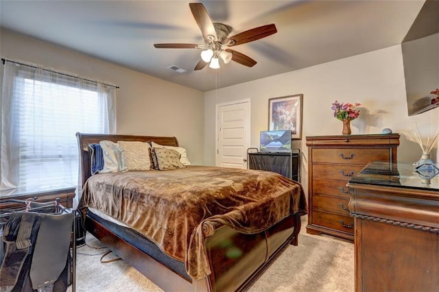 carpeted bedroom with ceiling fan