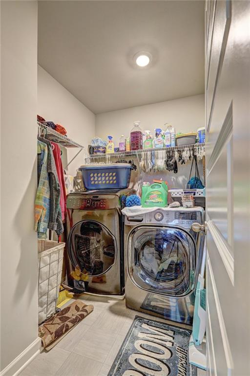 laundry room featuring independent washer and dryer