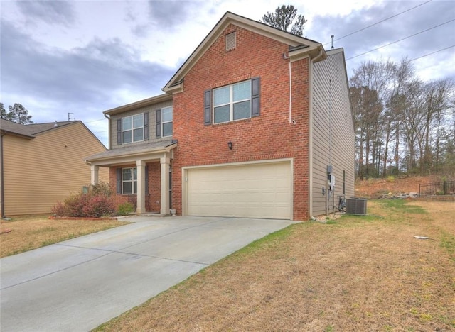 view of front of house featuring a front lawn, central AC unit, and a garage