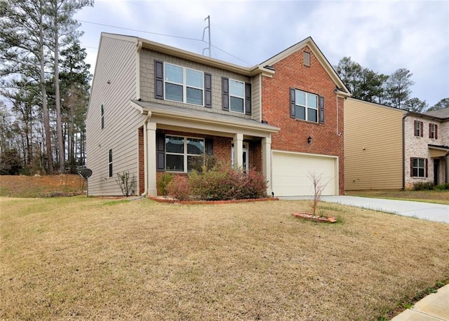 view of front of property featuring a garage and a front lawn