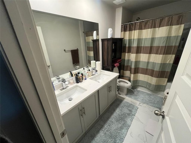 full bathroom with vanity, toilet, and shower / tub combo with curtain