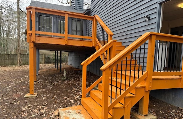 wooden deck featuring stairway