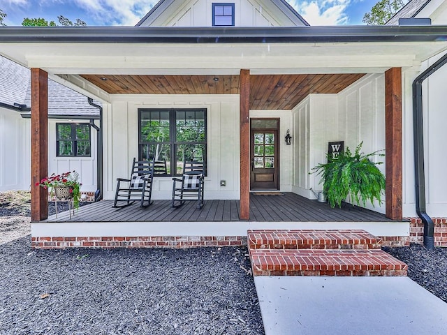 1170 Upper Sweetwater Trl SE, White, GA 30184 - doorway to property featuring board and batten siding and a porch