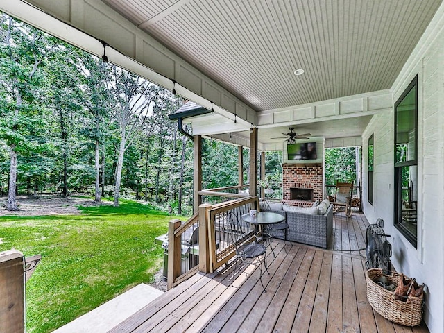 1170 Upper Sweetwater Trl SE, White, GA 30184 - wooden terrace featuring a lawn and an outdoor living space with a fireplace