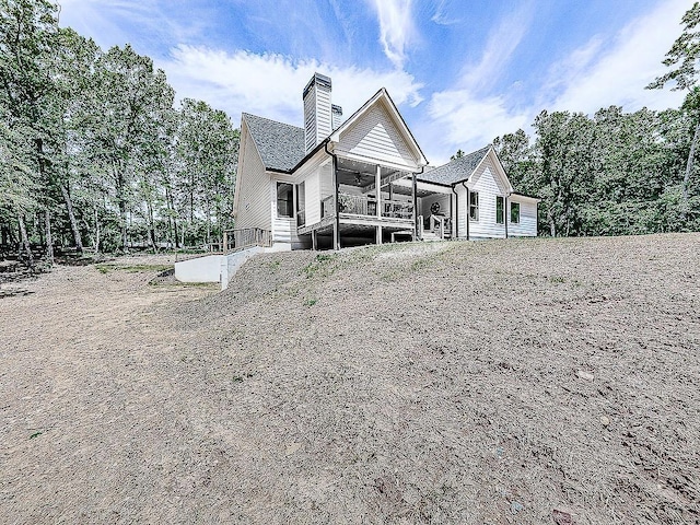 1170 Upper Sweetwater Trl SE, White, GA 30184 - back of property with a chimney and ceiling fan