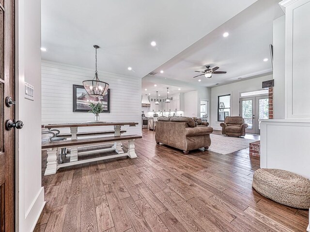 1170 Upper Sweetwater Trl SE, White, GA 30184 - living area with wood-type flooring, ceiling fan with notable chandelier, and recessed lighting