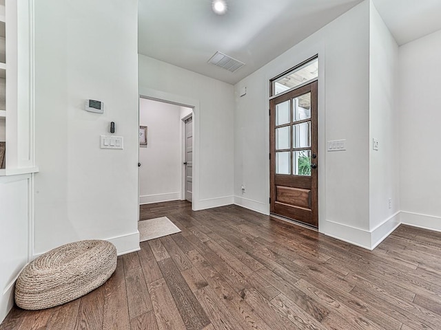 1170 Upper Sweetwater Trl SE, White, GA 30184 - foyer featuring baseboards, visible vents, and wood-type flooring