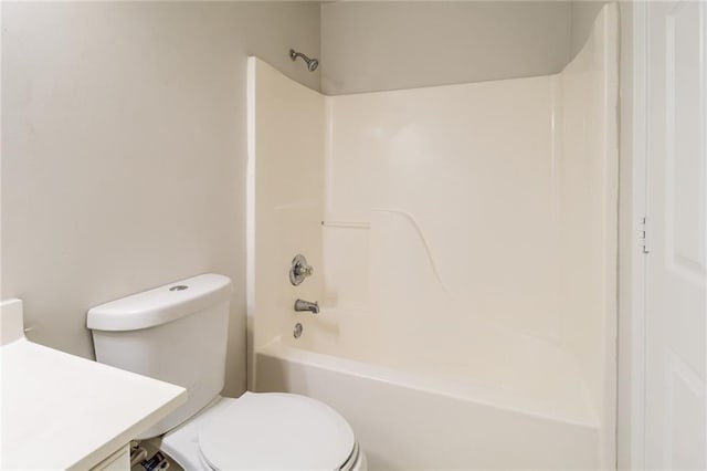full bathroom with toilet,  shower combination, and vanity