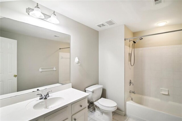 full bathroom featuring shower / bathing tub combination, toilet, tile patterned flooring, and vanity