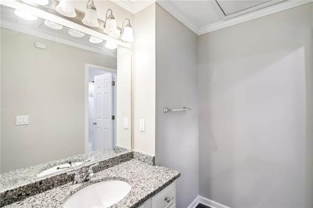 bathroom featuring vanity and ornamental molding