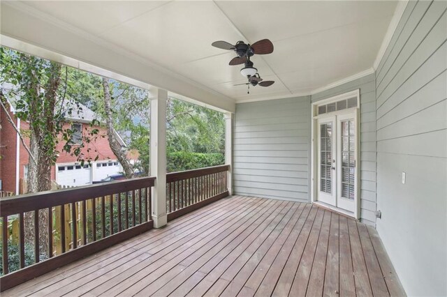 wooden terrace with ceiling fan