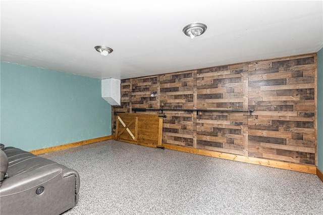 16 Bay Ct SW, Cartersville, GA 30120 - unfurnished living room featuring baseboards and speckled floor