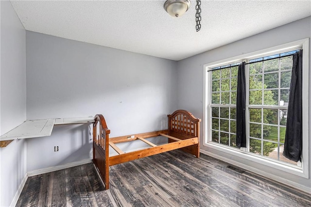 16 Bay Ct SW, Cartersville, GA 30120 - bedroom with wood finished floors and a textured ceiling