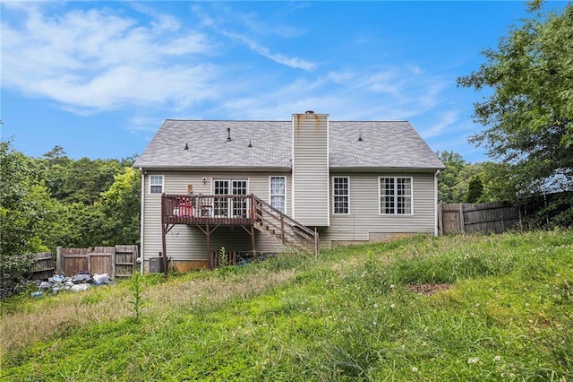 16 Bay Ct SW, Cartersville, GA 30120 - back of house featuring a wooden deck, a chimney, and stairs
