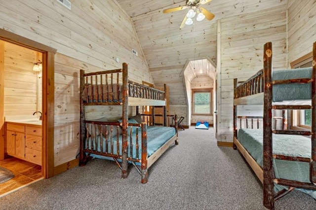 311 Bailey Farm Ln, Mineral Bluff, GA 30559 - carpeted bedroom featuring wooden walls, vaulted ceiling, multiple windows, and wooden ceiling