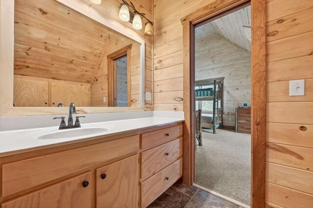311 Bailey Farm Ln, Mineral Bluff, GA 30559 - bathroom with vaulted ceiling, wooden walls, vanity, and wood ceiling
