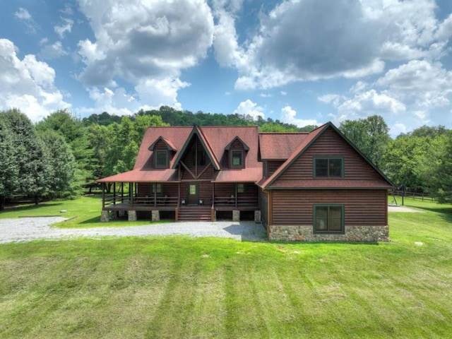 311 Bailey Farm Ln, Mineral Bluff, GA 30559 - view of front of property with a porch, a front yard, stone siding, and log veneer siding