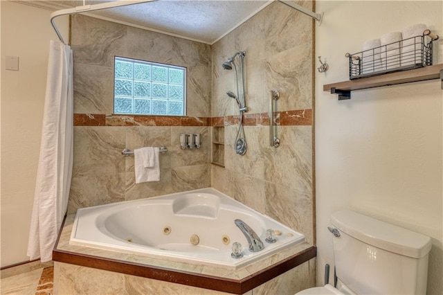 bathroom featuring toilet, a textured ceiling, and a combined bath / shower with jetted tub