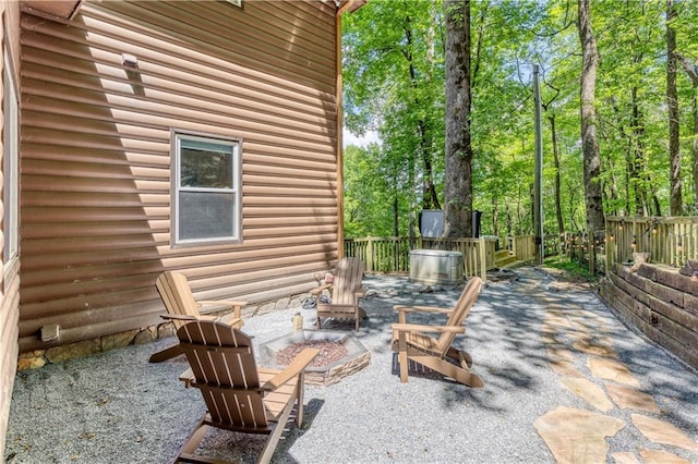 view of patio / terrace featuring fence