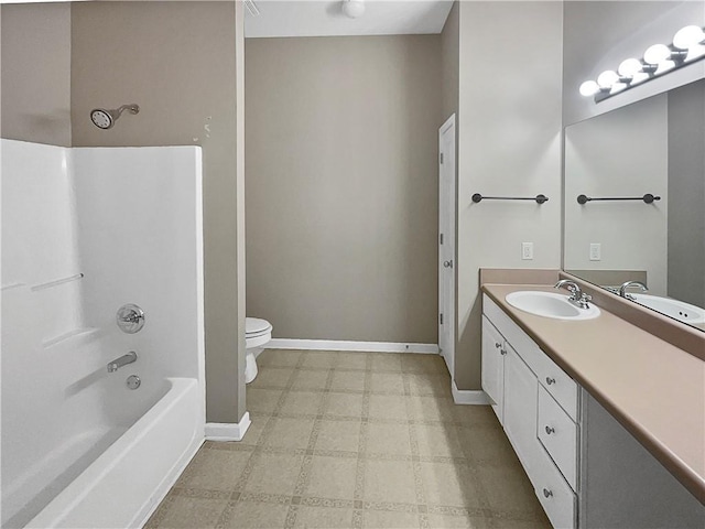 full bathroom featuring vanity, tub / shower combination, and toilet