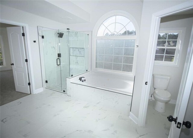 full bathroom with baseboards, toilet, a marble finish shower, marble finish floor, and a garden tub